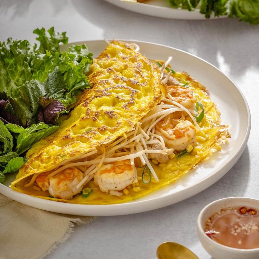 Bánh Xèo (Crispy Vietnamese Pancake) are Vietnamese sizzling crepes