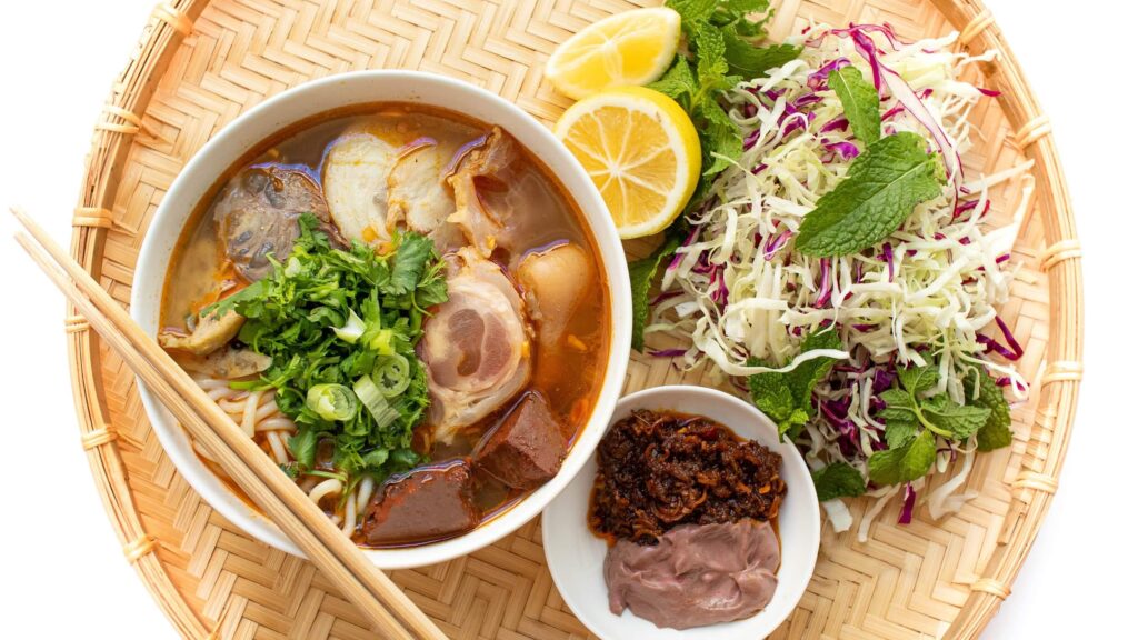 Taste a spicy and aromatic Vietnamese noodle soup called Bun Bo Hue