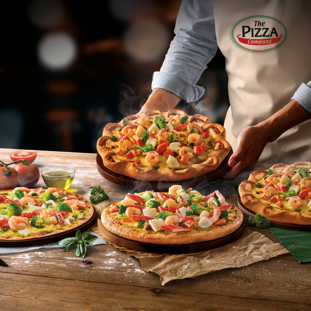 The Pizza Company is known for its Seafood Deluxe Pizza with chunky toppings, premium cheese, and flavors tailored to Vietnamese tastes